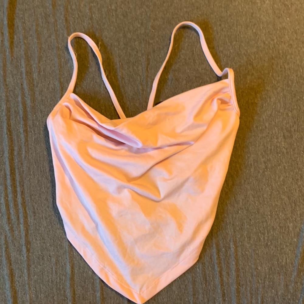 Droopy front with tie in the back mostly an open back